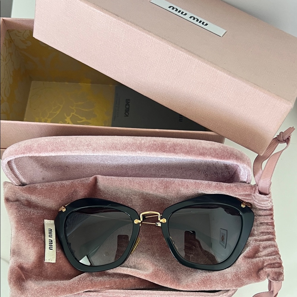 Miu Miu Black and Gold Sunglasses